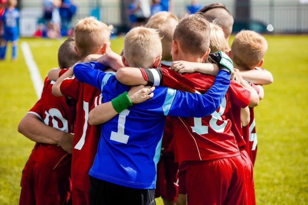 Photo of children playing sport